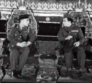 الملك فيصل الثاني والملك حسين بن طلال ملك الأردن