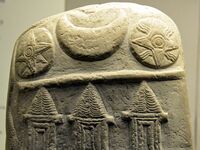 The solar symbol of Shamash (right) on a kudurru.