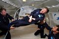 Physicist Stephen Hawking in an aircraft flying a parabolic trajectory to simulate zero-gravity