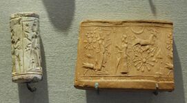 Mesopotamian limestone cylinder seal and impression showing people worshipping Shamash (Louvre)
