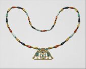 Pectoral and necklace of Princess Sithathoriunet; 1887–1813 BC; gold, carnelian, lapis lazuli, turquoise, garnet & feldspar; height of the pectoral: 4.5 cm (1.8 in); Metropolitan Museum of Art (New York City)