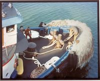 Panamanian tugboat outfitted with lines and ropes used when helping maneuver ships