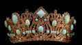 Crown of Empress Marie Louise. Set in silver, the 950 diamonds weigh 700 carats. The 79 original emeralds have been replaced with Persian turquoise cabochons.