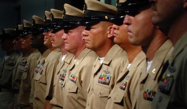 Chief petty officers of the U.S. navy in their khaki service uniforms.