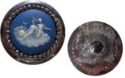 Wedgwood button with Boulton cut steels, depicting a mermaid & family, England, 1760ح. 1760. Diameter just over 32 mm (11⁄4")