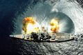 American battleship USS Iowa fires an artillery salvo