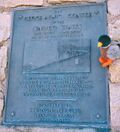 A close-up of the plaque on the historical marker