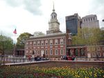 A building in red brick with a clock tower