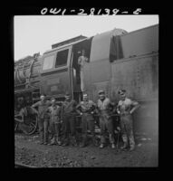 American and British railroad crews operated trains and trucks to bring supplies to the USSR. c.1943