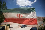 Iranian flag (as the Islamic Republic) in this photo.