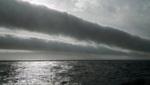 A sequence of volutus clouds at sea in the Drake Passage of the Southern Ocean
