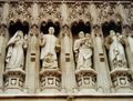 Four of the ten Christian martyrs depicted in statues above the Great West Door