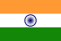 Horizontal tricolour flag (deep saffron, white, and green). In the center of the white is a navy blue wheel with 24 spokes.