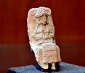 Mesopotamian female deity seated on a chair, Old-Babylonian fired clay plaque from Ur