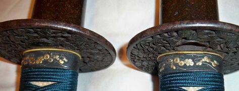 Daisho tsuba and fuchi (hand guard and hilt collar)