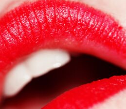 Red lipstick has been worn by women as a cosmetic since ancient times. It was worn by Cleopatra, Queen Elizabeth I, and film stars such as Elizabeth Taylor and Marilyn Monroe.
