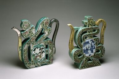 Pair of "Famille Verte" wine pots in the form of Fu (福code: zh is deprecated ) on the left and Shou (壽code: zh is deprecated ) on the right