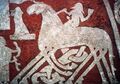 Detail of figure riding an eight-legged horse on the Tjängvide image stone but it is low resolution.