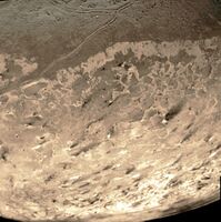 Dark streaks across Triton's south polar cap surface, thought to be dust deposits left by eruptions of nitrogen geysers.