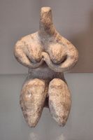 Stylized seated female figure with arms folded under her breasts, from Samarra, ca. 6000 BC