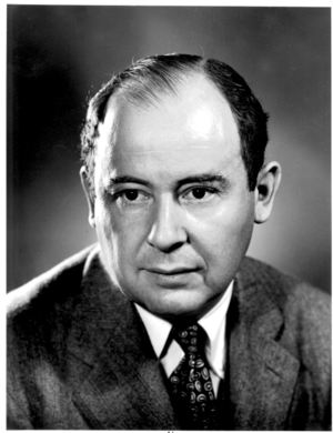 Formal photo of a balding man wearing a suit