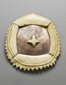 Breast Ornament (civa vonovono); circa 1850; whale ivory, pearl shell and fiber; height: 12.7 cm, diameter: 17.78 cm; from Fiji; Los Angeles County Museum of Art