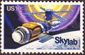 SkyLab commemorative stamp, Issue of 1974. The commemorative stamp reflects initial repairs to the station, including the parasol sunshade.