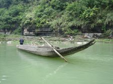 Traditional Miao Boat used to travel down rapids for trading goods.