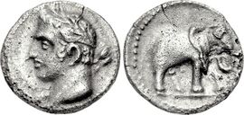 Image of both sides of a coin: one depicting a man's head; the other an elephant