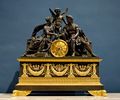 A French Empire mantel clock representing Mars and Venus, an allegory of the wedding of Napoleon I and the Archduchess Marie Louise. Ca. 1810.