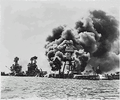 Aftermath: USS West Virginia (severely damaged), USS Tennessee (damaged), and the USS Arizona (sunk).