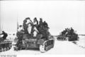 Panzer IV's of the relief force laden with accompanying infantry move out (description abbreviated from near identical image in Nash, p. 159)