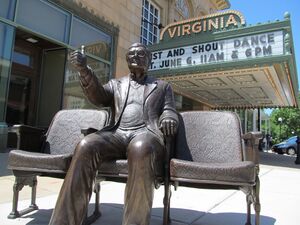 A statue of Roger Ebert outside the Virginia Theater.
