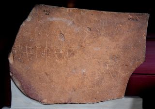 Safaitic script with a figure of a camel on a red sandstone fragment, from es-Safa, currently housed in the British Museum.jpg