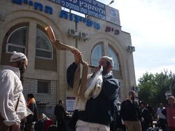 Hasidic Jew, blowing the kudu shofar in Uman, Ukraine, 2010.