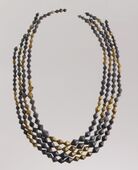 Sumerian necklace beads; 2600–2500 BC; gold and lapis lazuli; length: 54 cm; Metropolitan Museum of Art