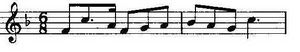Musical notation showing a theme in F and in 6/8 time on a treble clef.