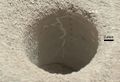 "John Klein" mudstone - drill hole (1.6 cm (0.63 in)) made by Curiosity (Yellowknife Bay; May 10, 2013).