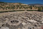 Foundations of former circular buildings.