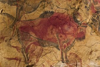 Bison in red ochre in the Cave of Altamira, Spain, from upper Paleolithic era (36,000 BC)
