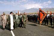 Ayatollah Ali Khamenei inspecting troops with the Islamic Republic military colors during a special ceremony.
