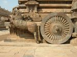 Horse-drawn chariot carved onto the mandapam of Airavateswarar temple, Darasuram, c. 12th century AD (left). The chariot and its wheel (right) are sculpted with fine details