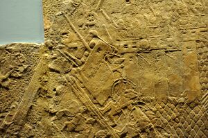 Assyrian siege-engine attacking the city wall of Lachish, part of the ascending assaulting wave. Detail of a wall relief dating back to the reign of Sennacherib, 700-692 BCE. From Nineveh, Iraq, currently housed in the British Museum.jpg