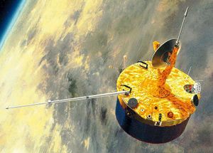 A stubby barrel-shaped spacecraft in orbit above Venus. A small dish antenna is at the centre of one of its end faces