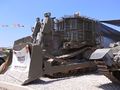 IDF Caterpillar D9 armored bulldozer - used with the standard blade or a special mineplow for demining and removal of IEDs