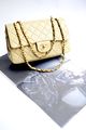 Chanel classic handbag in quilted-leather, with adjustable double-chains, to wear it on the arm or at the shoulder.