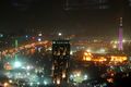 Cairo Tower at night, with the Sofitel Hotel in Gezira Island. Seen in purple colour scheme (2008).