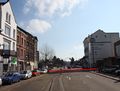 A border within a closely built-up area – here near Aachen between ألمانيا and هولندا: Germany starts at the red line drawn in the photo.