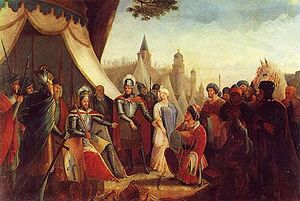 Painting of a group of men clustered around a seated man in armor wearing a crown. Kneeling before the seated man is another man, with a third man standing between the two men and pointing at the kneeling man.