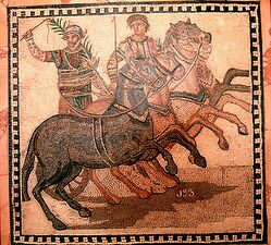 Ancient Roman mosaic of the winner of a chariot race, wearing the colors of the red team